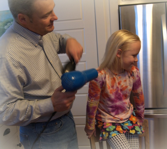 dad drying Nora's hair