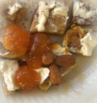 whole wheat french toast, with cream cheese, apricot jam, nutmeg, and almonds