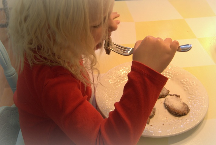 enjoying healthy purple snowman pancakes