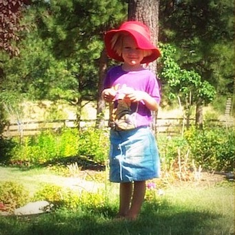 little girl in a red hat